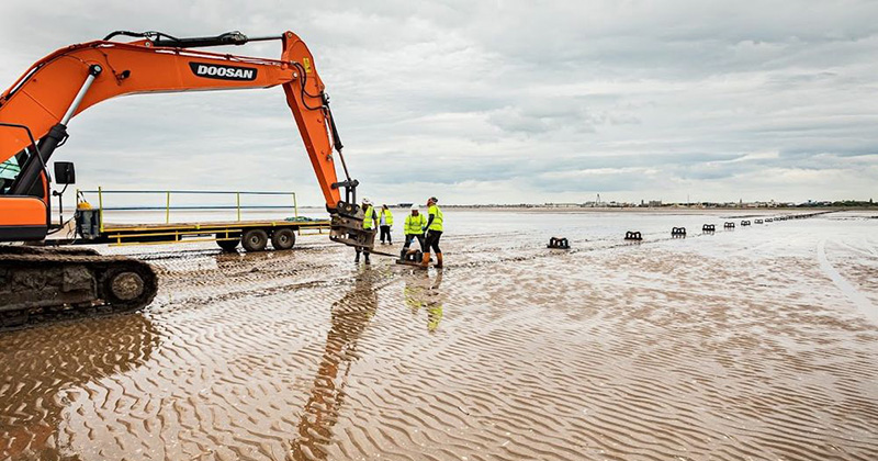 Shore-end work for euNetworks’ Rockabill subsea network, Southport Beach, United Kingdom. Image by euNetworks.